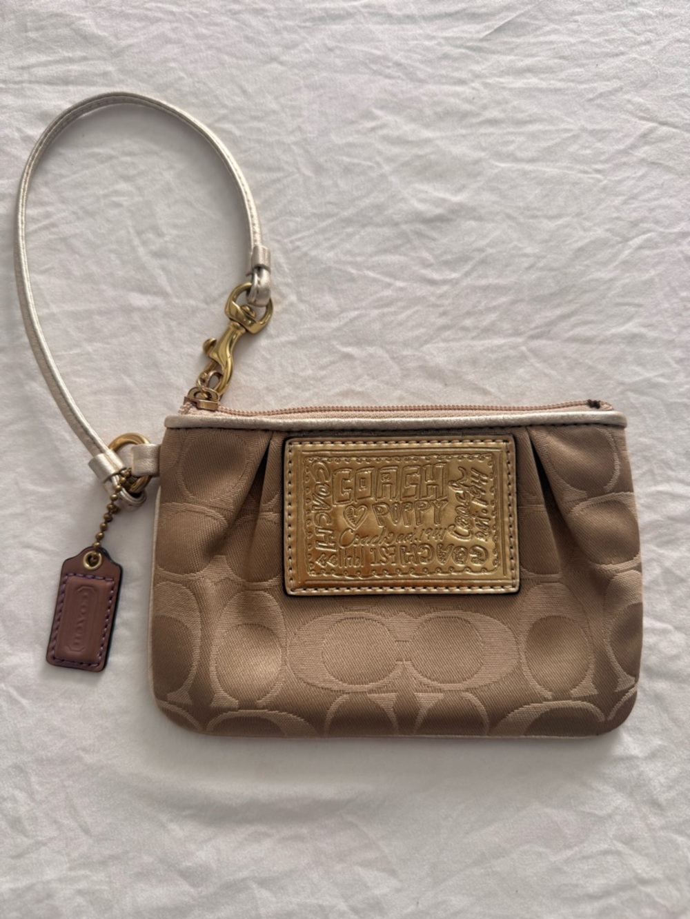Coach Beige Signature Canvas Wristlet with Gold Plaque